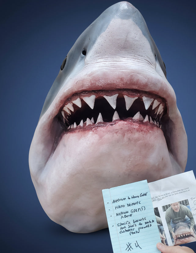 Shark head with a tag indicating medium core hard demarcation. great white shark scary